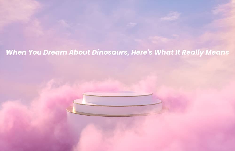 Picture of a spiritual background with the words When You Dream About Dinosaurs, Here's What It Really Means written on it